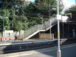 The stairs up from the platform for trams to Altrincham