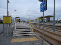 The platforms from by an access to the one for trams to Manchester